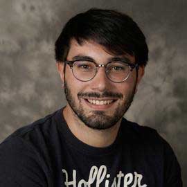 Profile of a man smiling