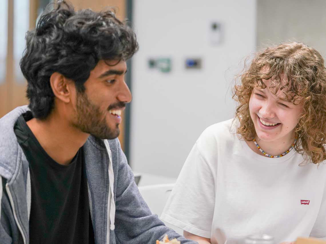 Man and woman laughing together